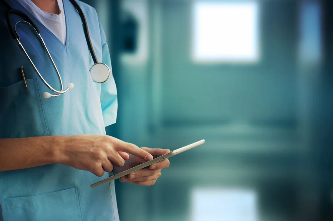 Healthcare And Medicine Doctor using a digital tablet